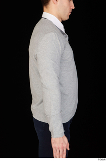 Tomas Salek arm business clothing dressed grey sweater upper body…